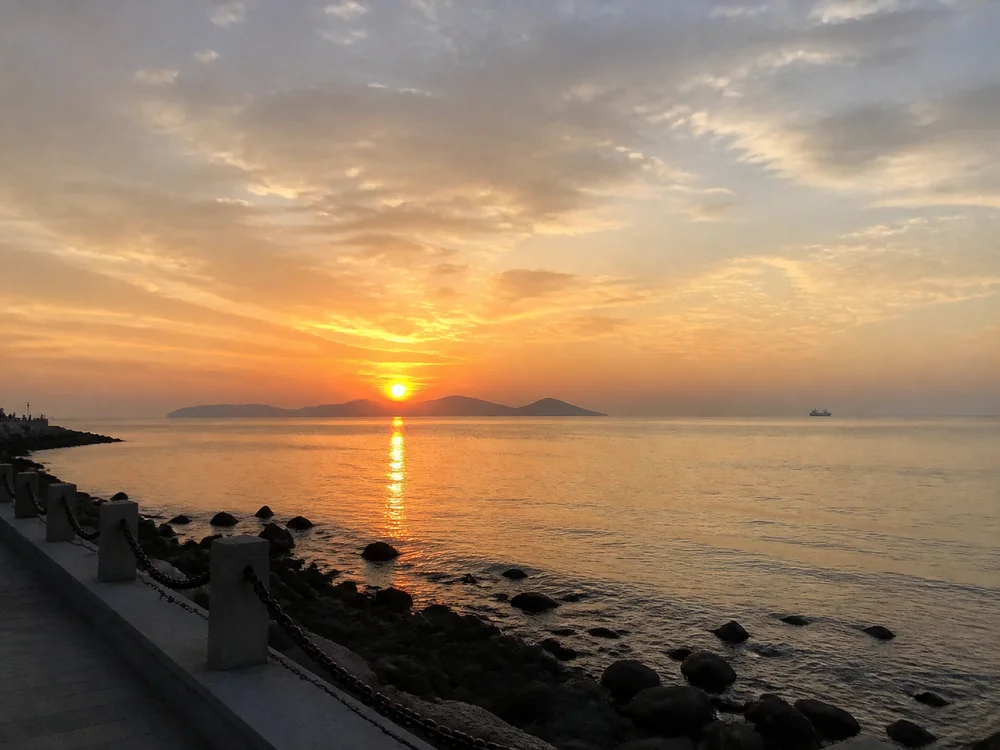 A sunset by the sea in the sample journal